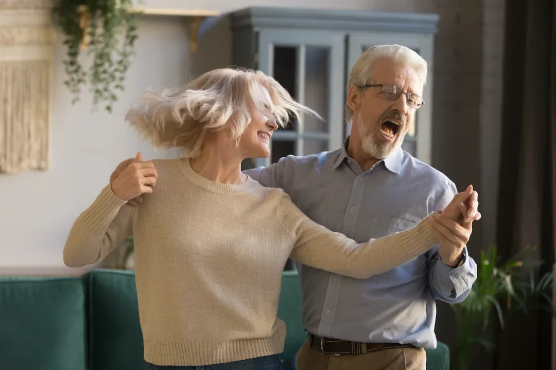 Overjoyed,Active,Retired,Mature,Couple,Dancing,Together,Enjoy,Leisure,Activity