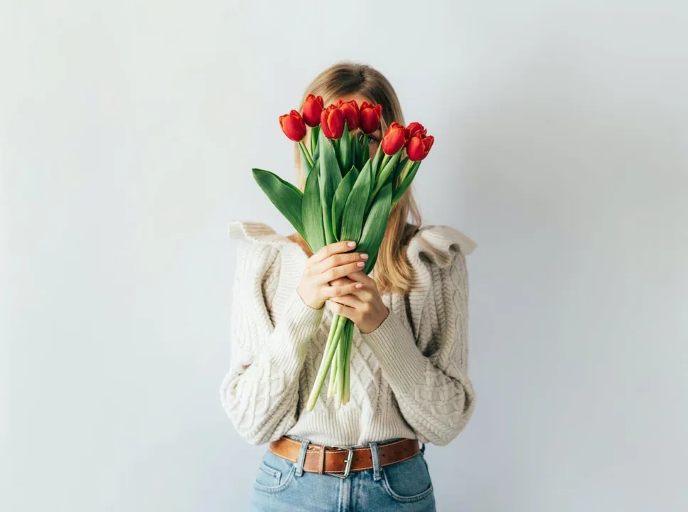 Portrait,Of,A,Stylish,Young,Woman,Hiding,Her,Face,With