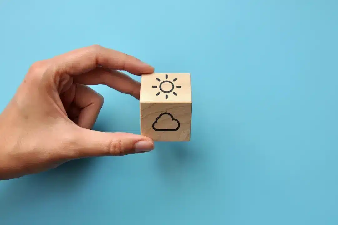 A,Wooden,Cube,With,A,Picture,Of,The,Sun,And