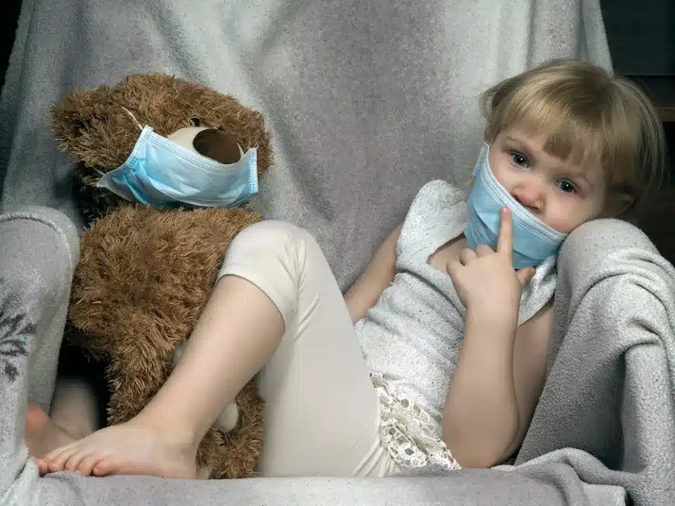 Small,Child,With,A,Toy,Bear,Cub,In,A,Medical